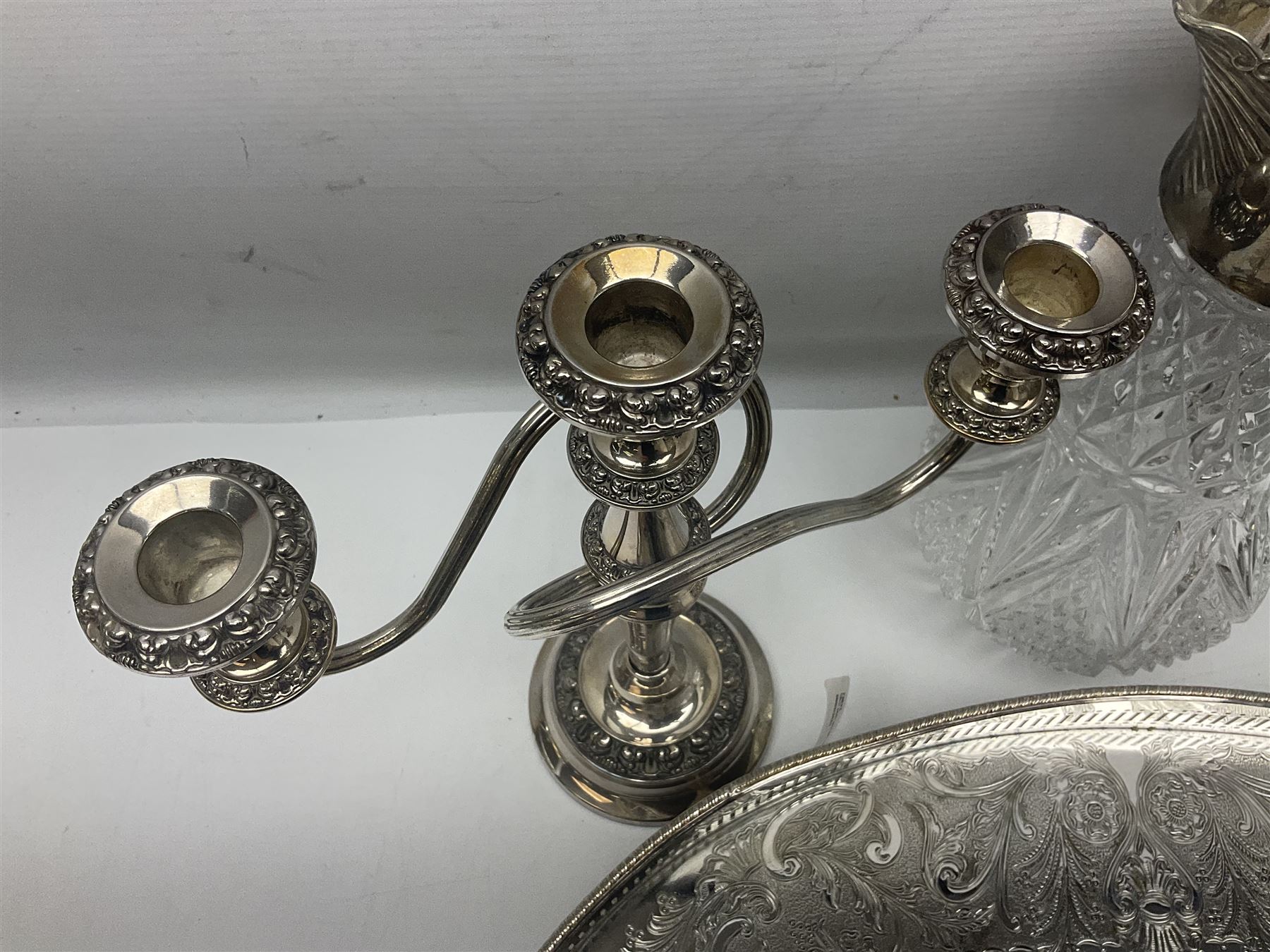 Glass claret jug, with silver plated top, together with other silver plate, to include pair of candelabras and tray with claw feet, jug H30