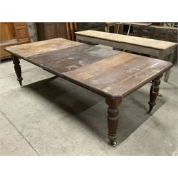 Late Victorian walnut dining table, moulded rectangular top with canted corners, two additional leaves and telescopic extending action, on ring turned and reed carved supports, brass cups and ceramic castors - THIS LOT IS TO BE COLLECTED BY APPOINTMENT FROM THE OLD BUFFER DEPOT, MELBOURNE PLACE, SOWERBY, THIRSK, YO7 1QY