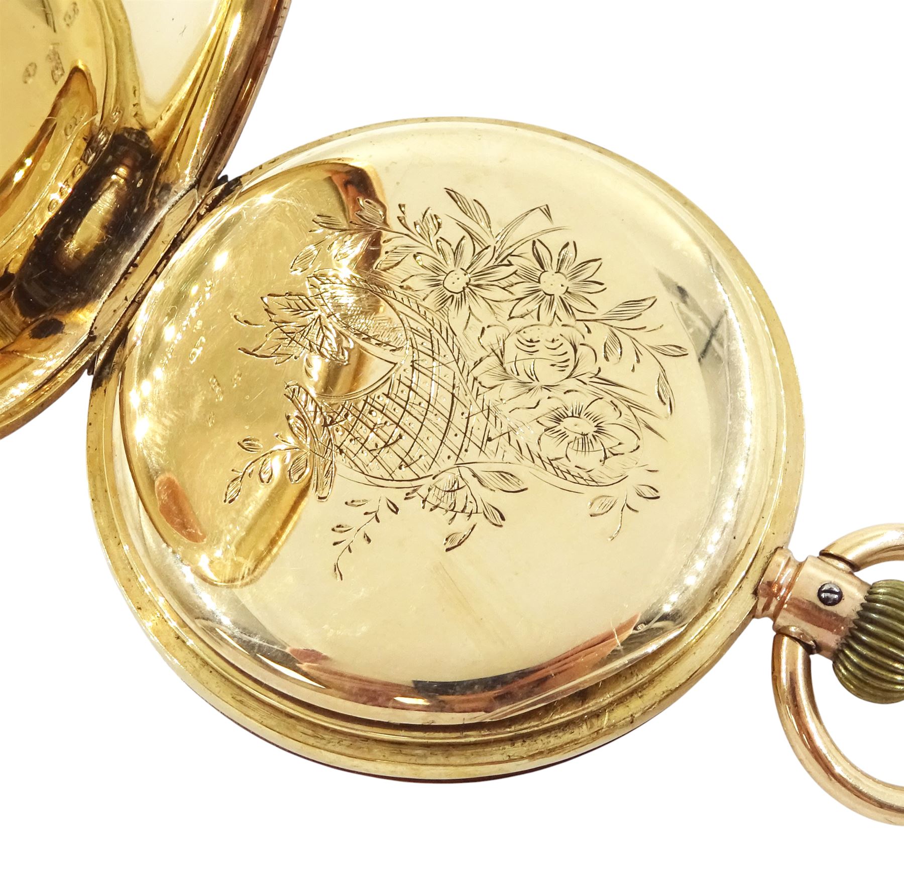 Early 20th century 9ct gold half hunter keyless lever pocket watch, No. 590035, white enamel dial with Roman numeral hour markers and subsidiary seconds dial, the inner dust cover with engraved flower basket decoration, case with London import marks 1916