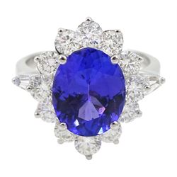 
18ct white gold oval tanzanite and round brilliant cut diamond cluster ring, with tapered baguette diamond shoulders, stamped 750, tanzanite 3.56 carat, total diamond weight 1.60 carat, with World Gemological Institute Report