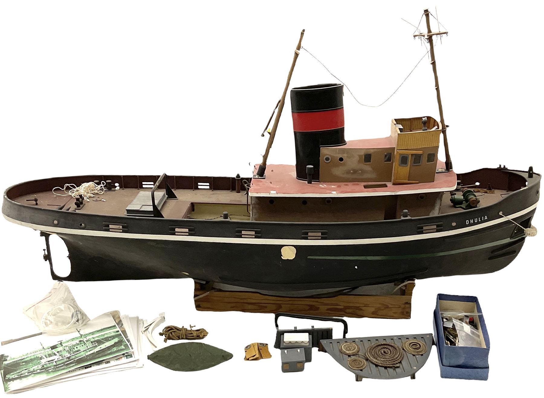 Large model of the tugboat 'Dhulia' on a wooden stand L144cm, together with a box of additional parts and plans