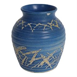 Quentin Bell 1910-1996: ribbed vase with fluted rim, decorated in white abstract design on a blue ground, signed Bell beneath, H16cm 