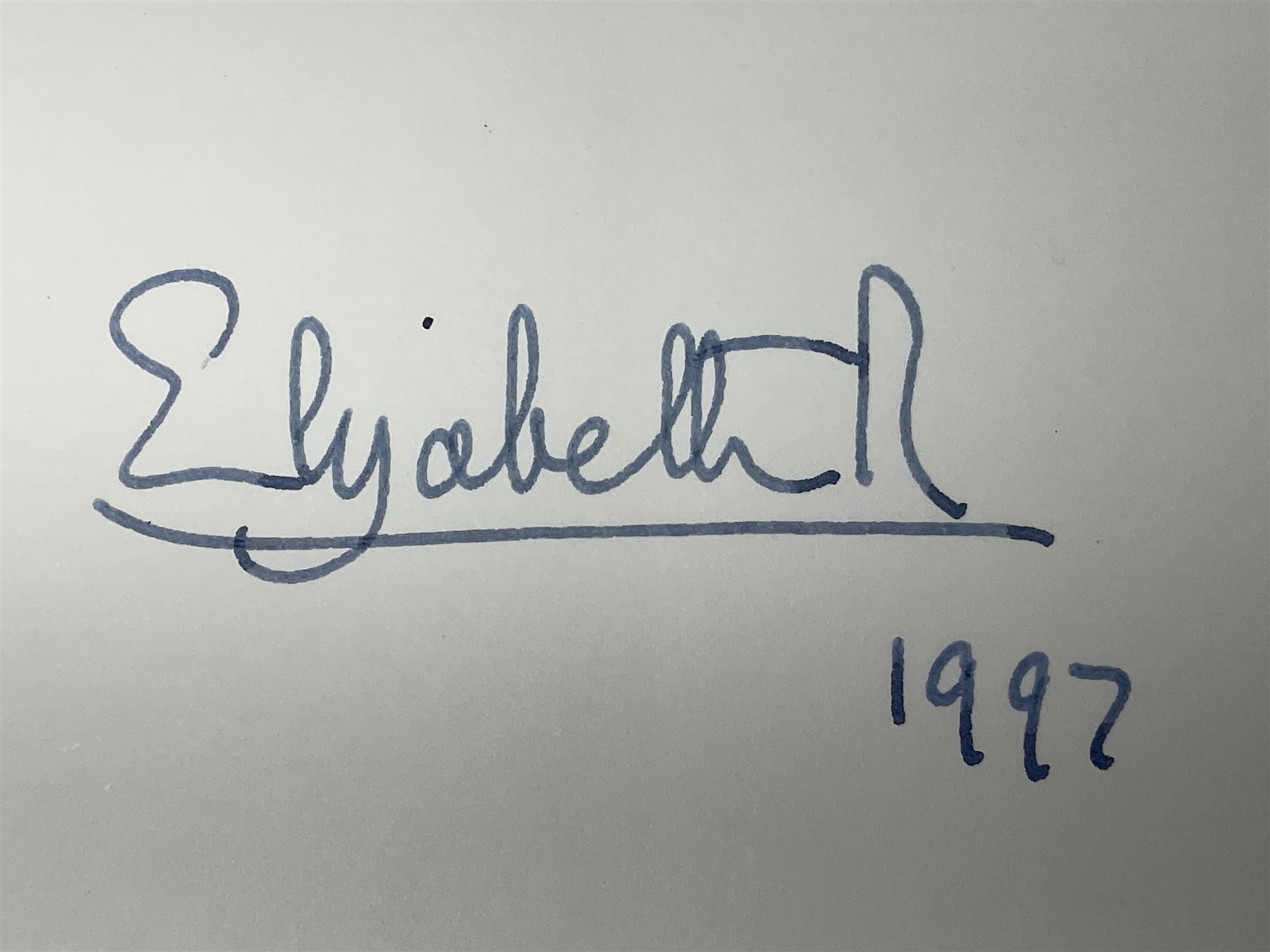 HM Queen Elizabeth II and HRH the Duke of Edinburgh - signed 1997 Christmas card with two gilt cyphers to front and colour photographic portrait inside,  signed Elizabeth R and Philip with manuscript date 1997 below