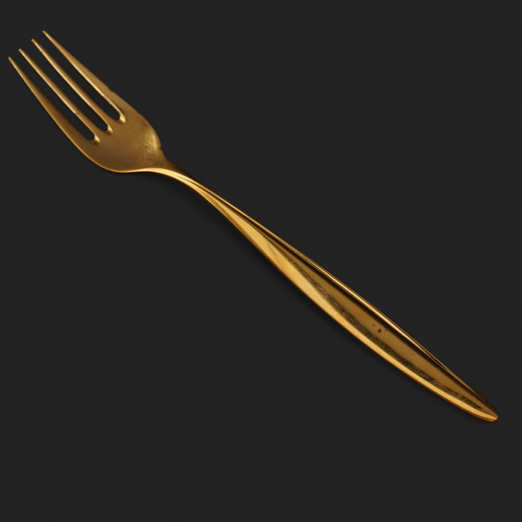 Extensive suite of WMF 800 silver gilt cutlery, for twelve covers, comprising twelve table knives and forks, fish knives and forks, dessert forks, table spoons, dessert spoons, teaspoons, eleven dessert forks and six serving spoons, with crescent moon and crown WMF hallmarks