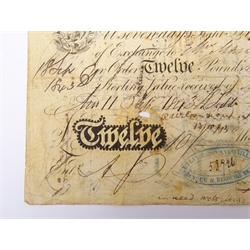  Bank Post Bill dated 1843 for the value of twelve pounds, large amount of writing to both the front and back of the note  