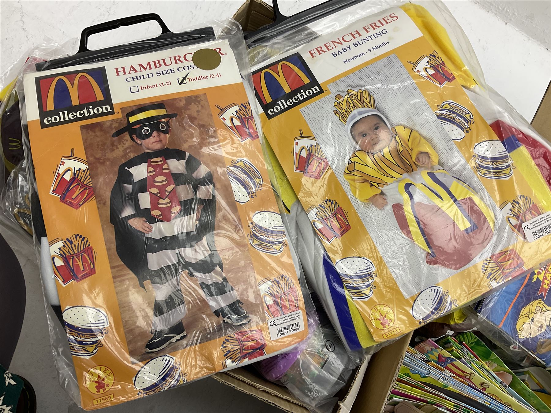 Two boxes of Mcdonalds memorabilia and merchandise