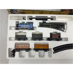 Hornby '00' gauge - Thomas The Tank Engine Series Gordon Passenger Electric Train Set with 4-6-2 locomotive No.4, tender, three coaches, accessories and original 1987 purchase receipt; together with Thomas the Tank Engine Electric Train Set with 0-6-0 tank locomotive No.1, two coaches, three wagons and accessories; both boxed (2)