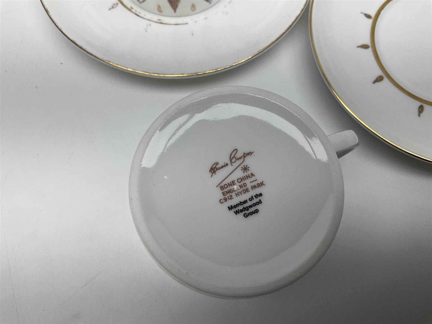 Susie Cooper Hyde Park pattern coffee set, comprising coffee pot, four coffee cans and saucers, dessert plates, together with three plates in a similar design 