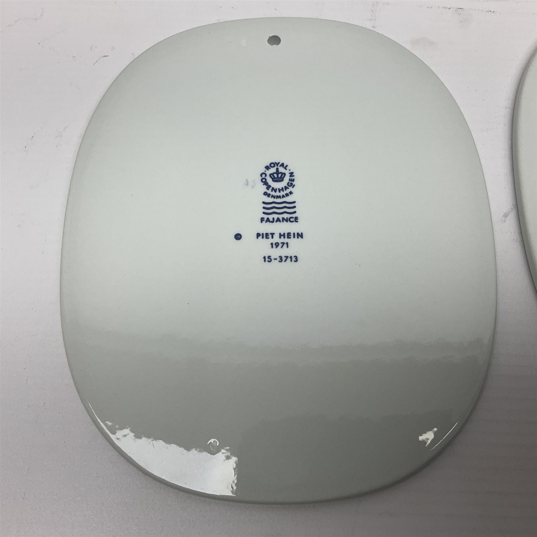 Seven Royal Copenhagen Piet Hein 1948-1980 plaques,all with printed mark to back H17cm