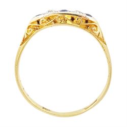 Early 20th century 18ct gold sapphire and diamond five stone ring, set with three round cut sapphires and two old cut diamonds and scroll engraved gallery 