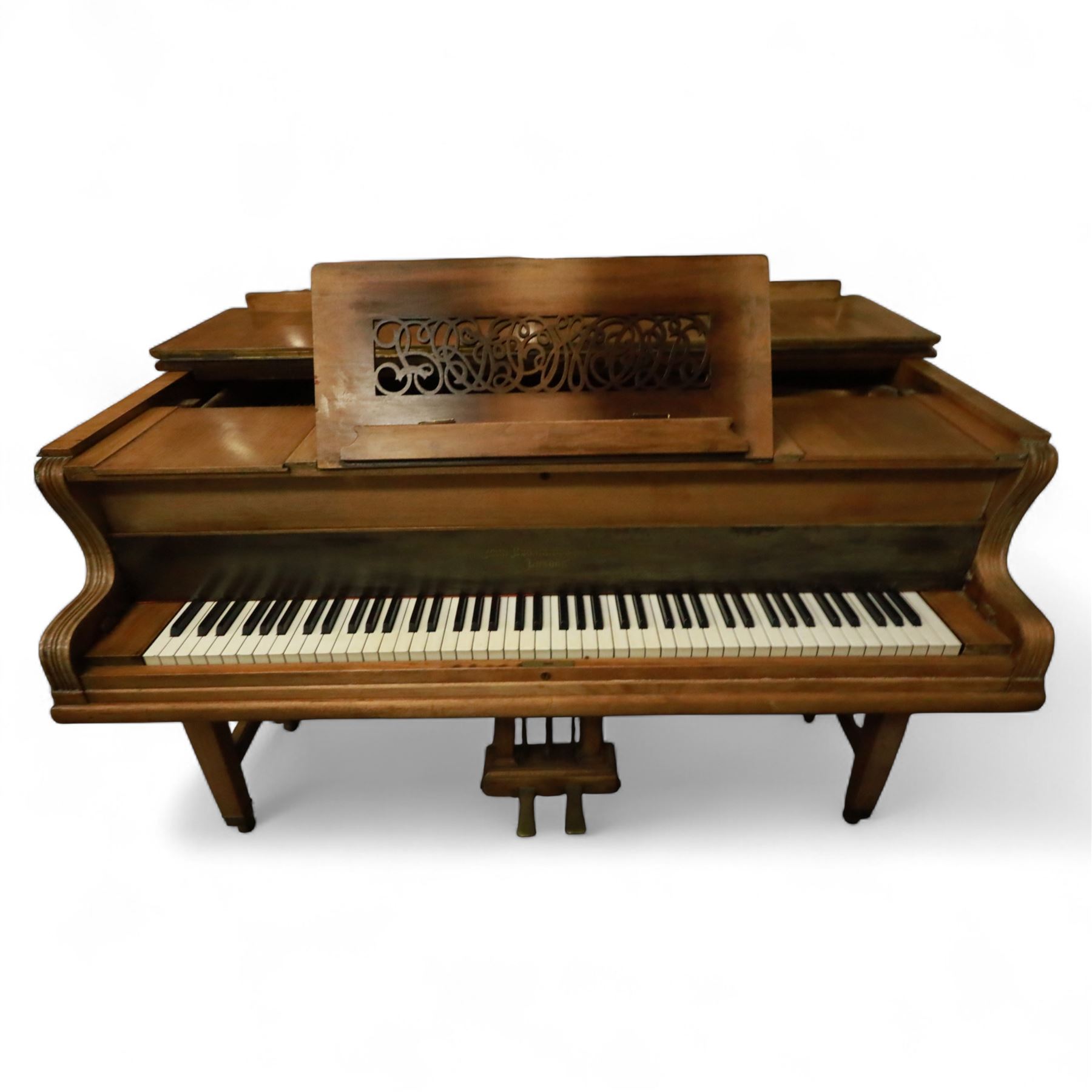 John Broadwood & Sons-20th century mahogany boudoir grand piano serial No 53529 (1920),  with twin square tapered legs and stretchers raised on brass castors, with an open fretted adjustable music desk and folding fallboard, conforming lyre with una-corda and sustain pedals, overstrung iron frame with original soundboard, action, hammers, dampers, felts, tuning pins and strings (two new base strings),  7-1/4 octave keyboard with 87 Ivory and ebonised keys (A0-B7), Tuned to concert pitch (A=440) however, requires tuning, action highly responsive with good repetition.

This item has been registered for sale under section 10 of the APHA Ivory Act Reference 4HSHGPGT