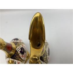 Pair of mid 20th century Royal Crown Derby Imari 1128 pattern Kedleston ewers, each with gilt scroll handle and neck, upon a gilt quatrefoil foot, each with printed marks beneath, H25.5cm