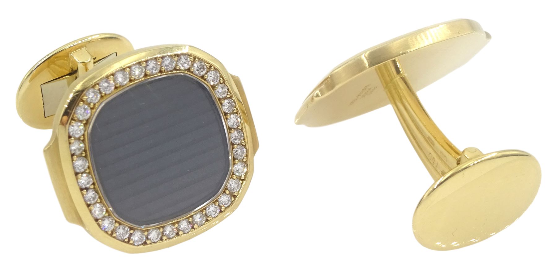 Pair of Patek Philippe Nautilus 18ct yellow gold and diamond cufflinks, with sapphire crystal, black-grey centre and diamond-set front, hallmarked, in original box
