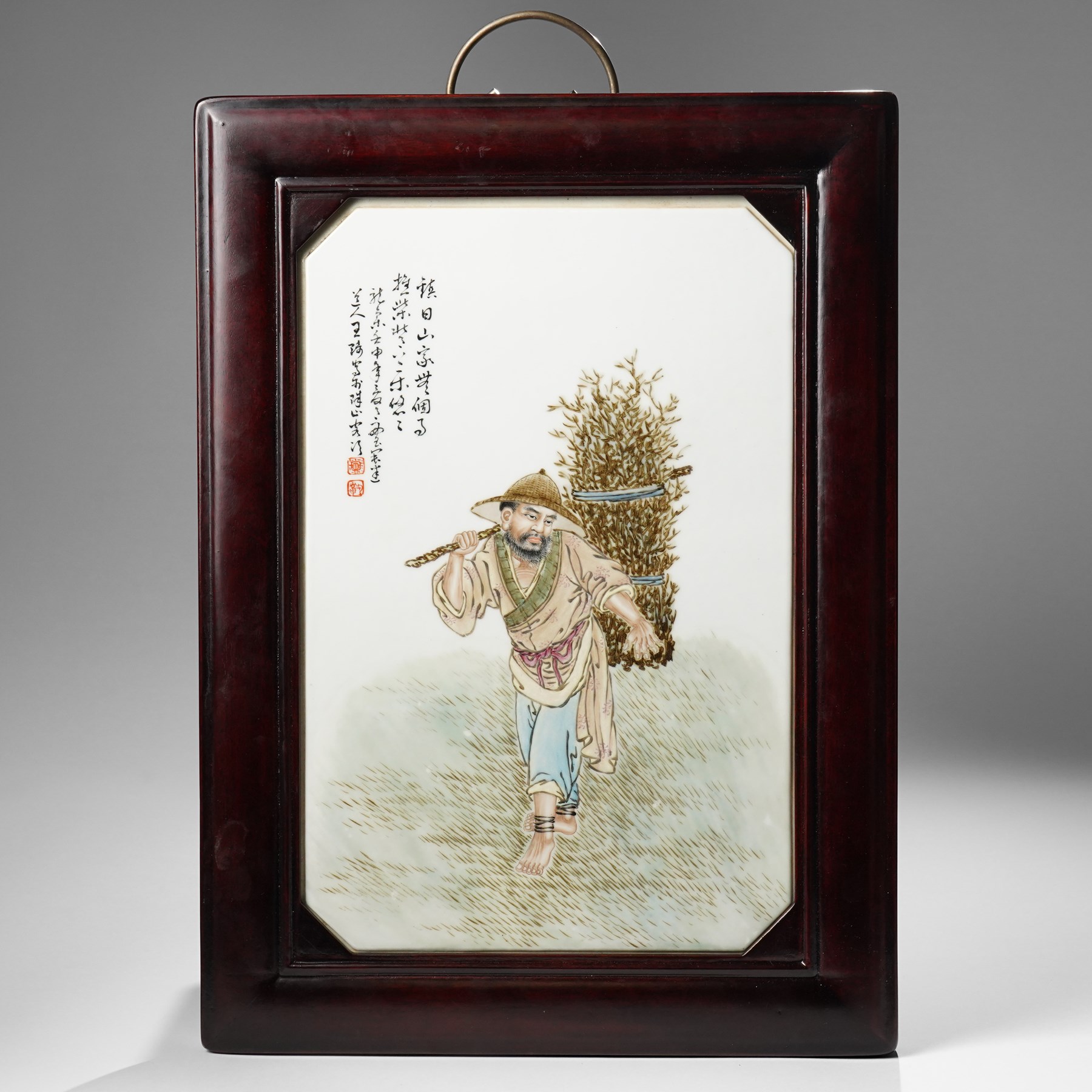 Manner of the Eight Friends of Zhushan (Chinese 19th/20th Century): Woodcutter Heading Home, painted porcelain plaque mounted in lacquered frame, overall 46cm x 34cm 