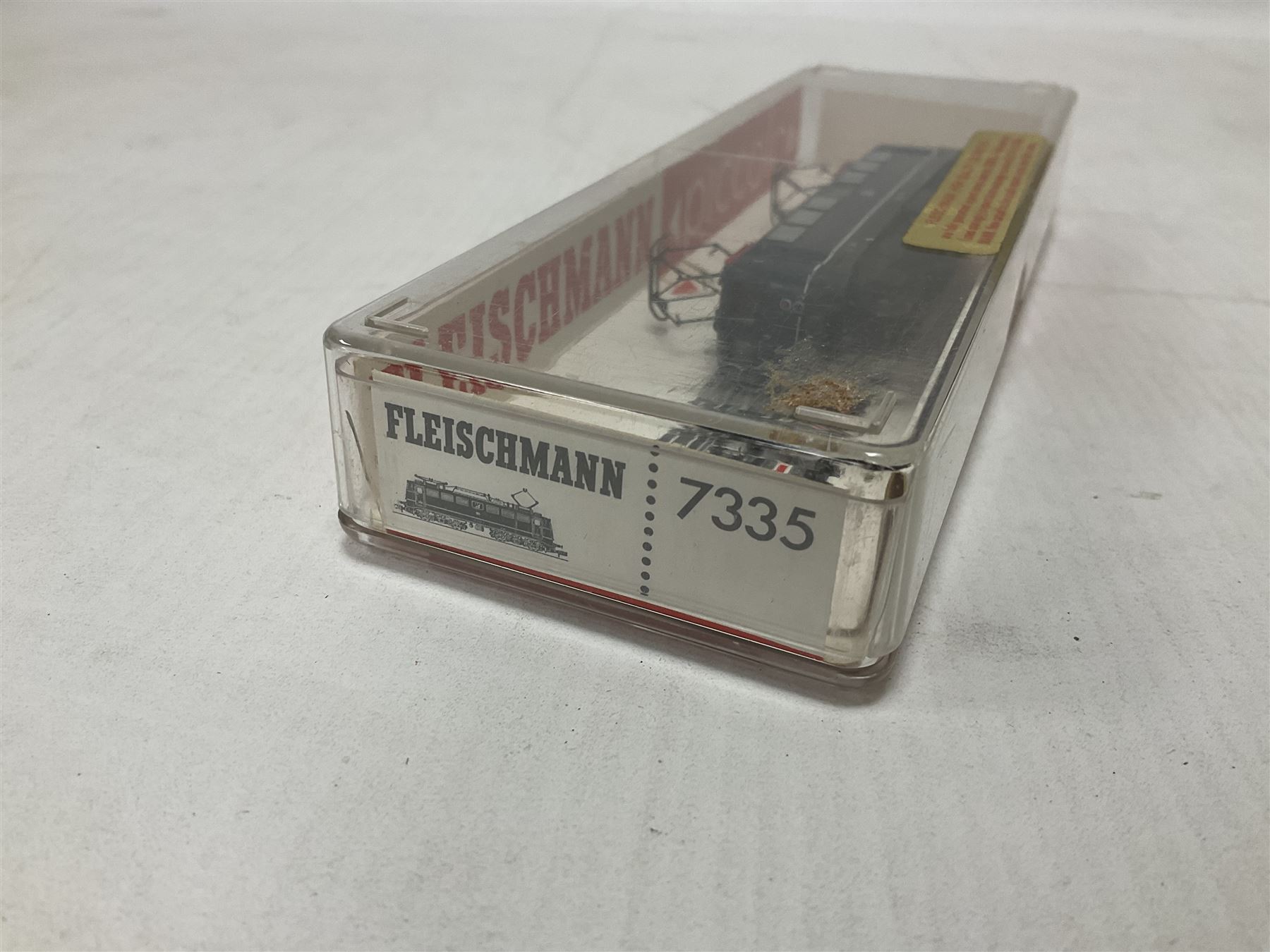 Fleischmann ‘N’ gauge ‘Piccolo’ - Black tank engine no.7000, brown diesel shunter no.7230, boxed dark blue electric locomotive with pantograph no,7335 and dark green class 132 locomotive with pantograph no.7369 (4) 