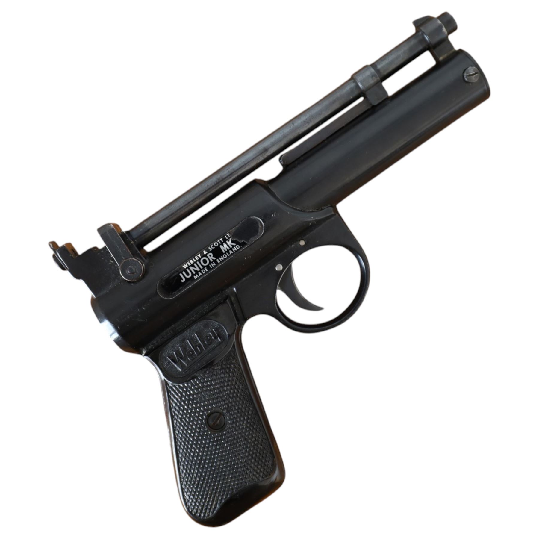 Webley Junior MK II .177 air pistol, the chamber marked 'Webley & Scott Ltd. Junior MK II Made in England', with black chequered grip