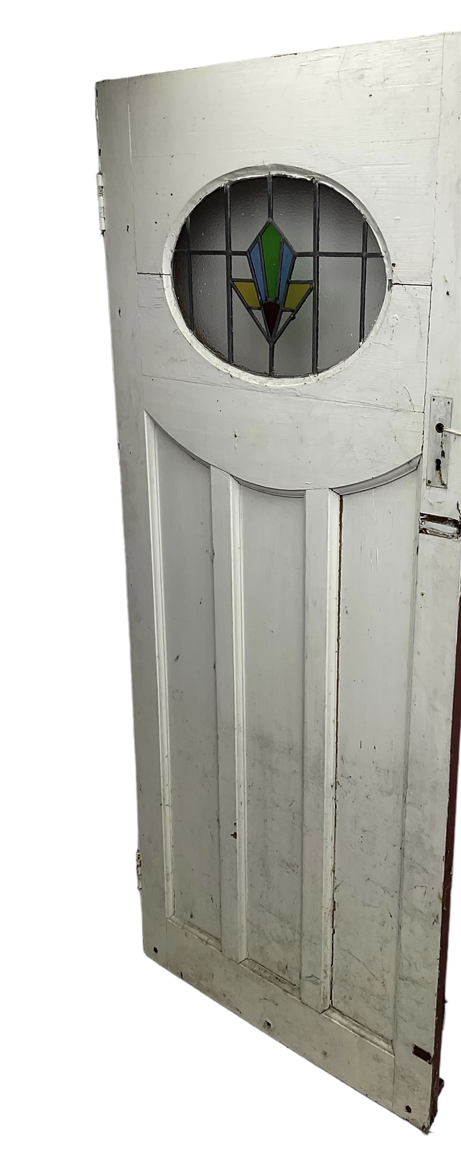 1930s external door with stained leaded glass panel (86cm x 203cm), six small stained glass windows in wooden frames (W52cm); and various loose stained leaded glass panels
