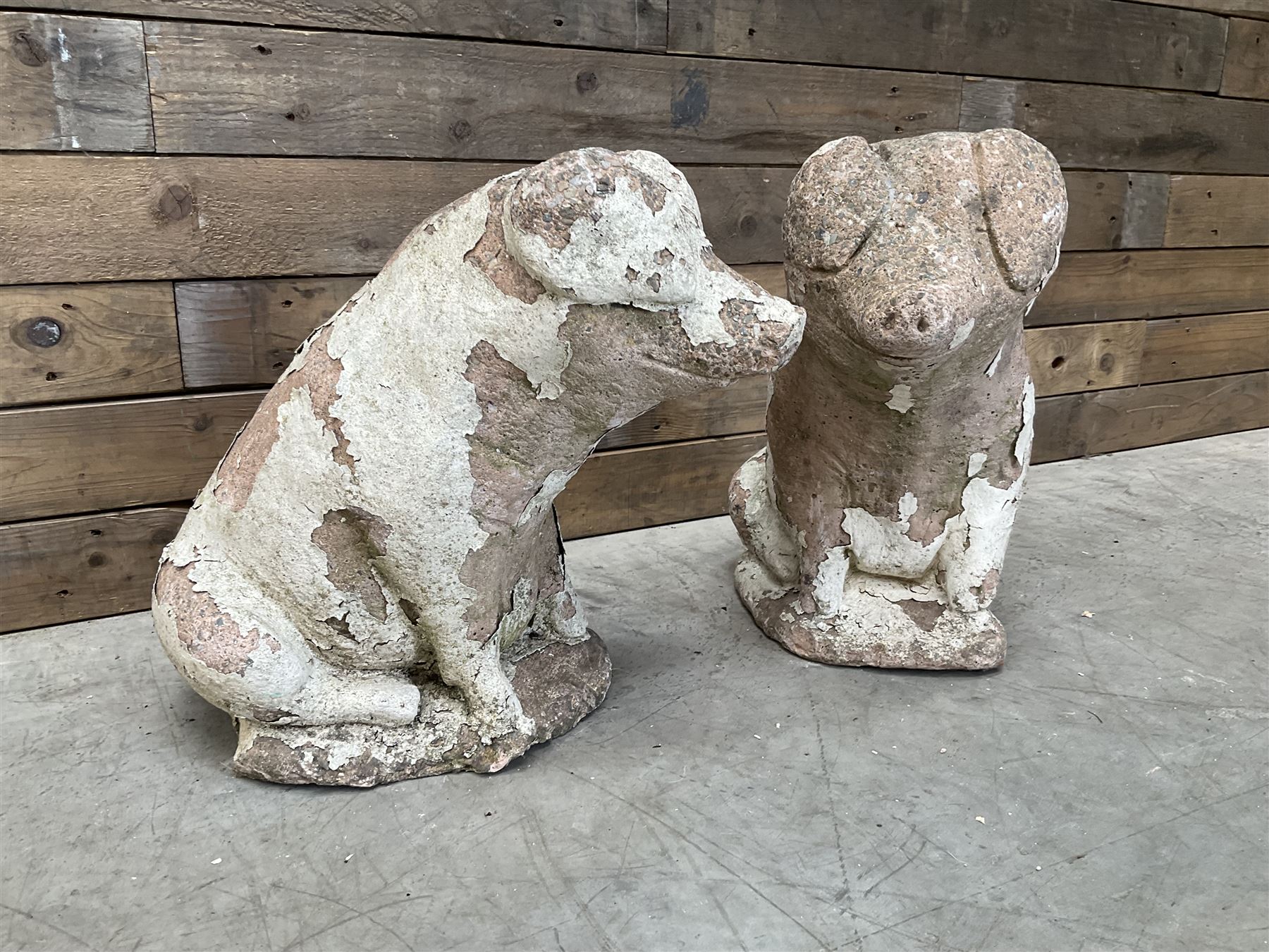 Pair painted stone pigs 
