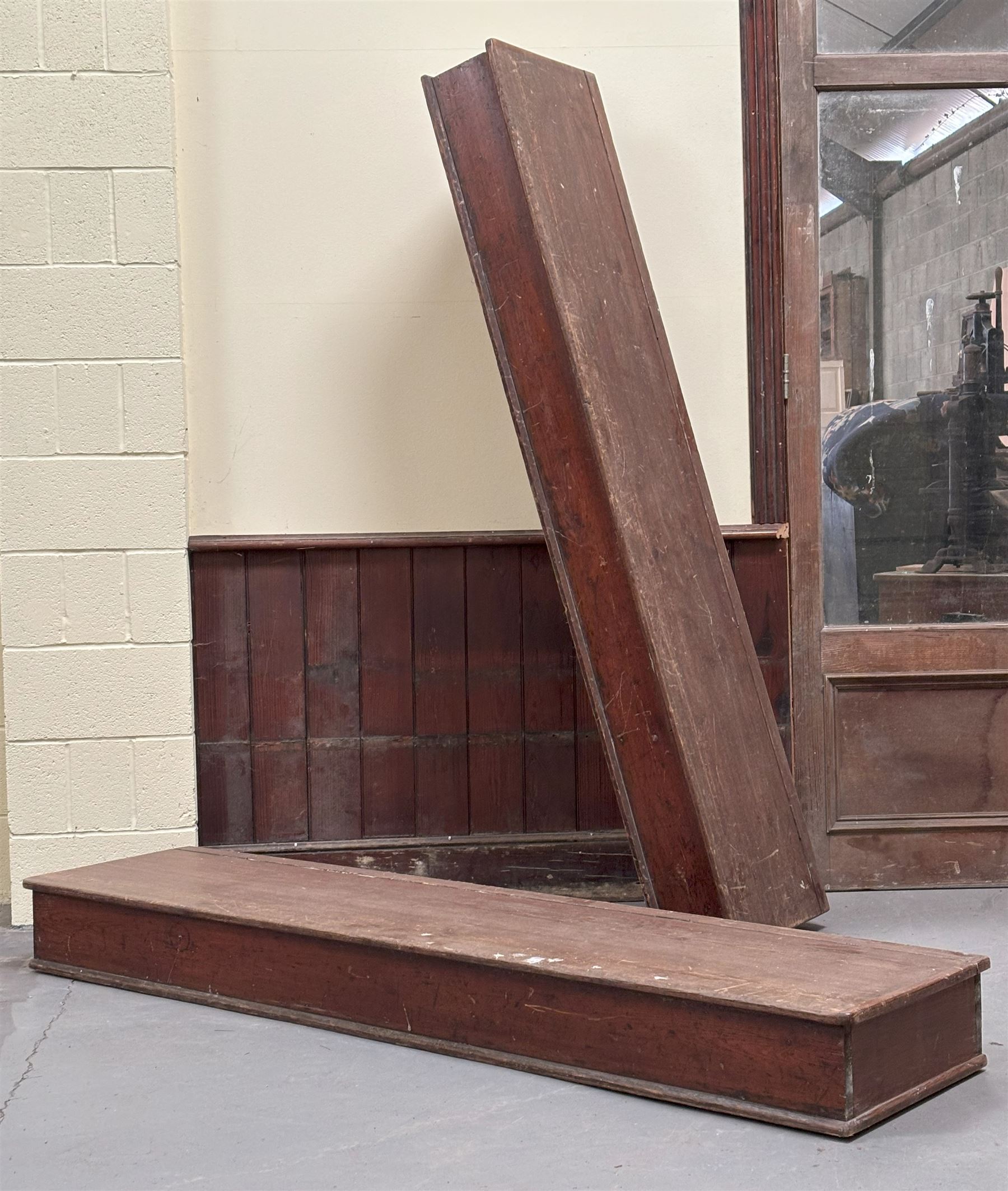 Pair of stained pine long boxes, early 20th century, with hinged lids and moulded base, one with wrought iron carry handle to each end. L203cm, D48cm, D20cm.  - COLLECTION BY APPOINTMENT FROM: The White House, Thirsk Road, Easingwold, York, YO61 3NF - CALL 01723 507111 TO ARRANGE
