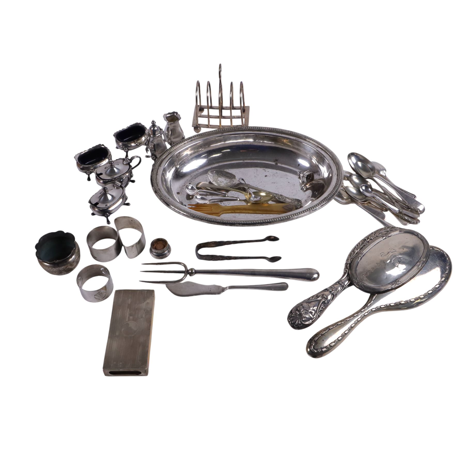 Group of silver, including matchbox cover, open salt, brush mounts and three napkin rings, together with a collection of silver plated cutlery, cruets etc