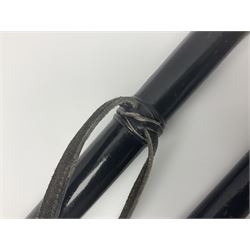 Two ebonised walking sticks, one with 'Leeds City Police' embossed top, tallest H92cm