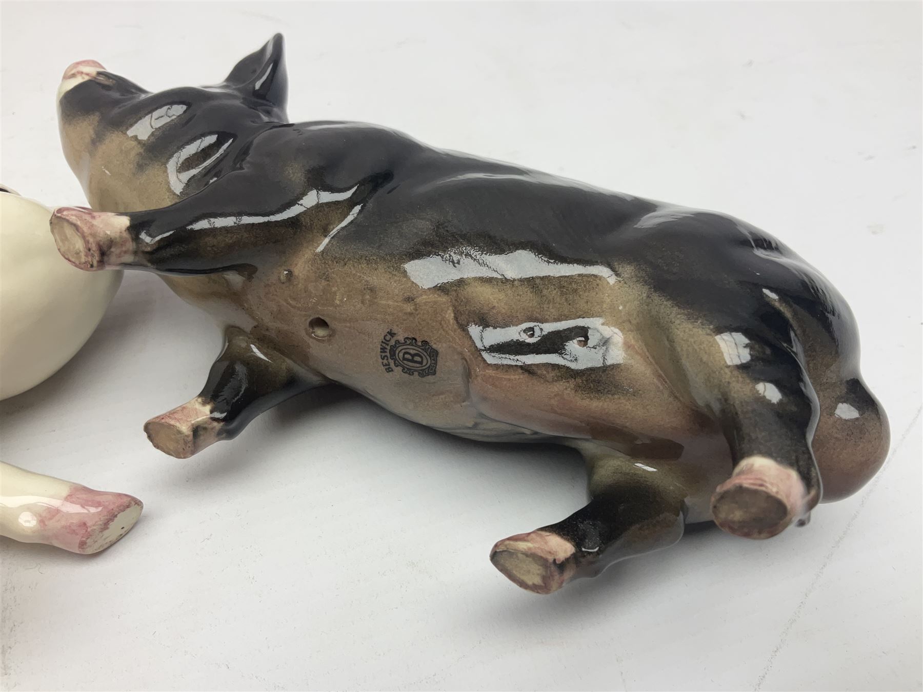 Two beswick rare breed pigs, comprising Middlewhite Boar No 4117 and Berkshire Boar No 4118, with printed marks beneath 