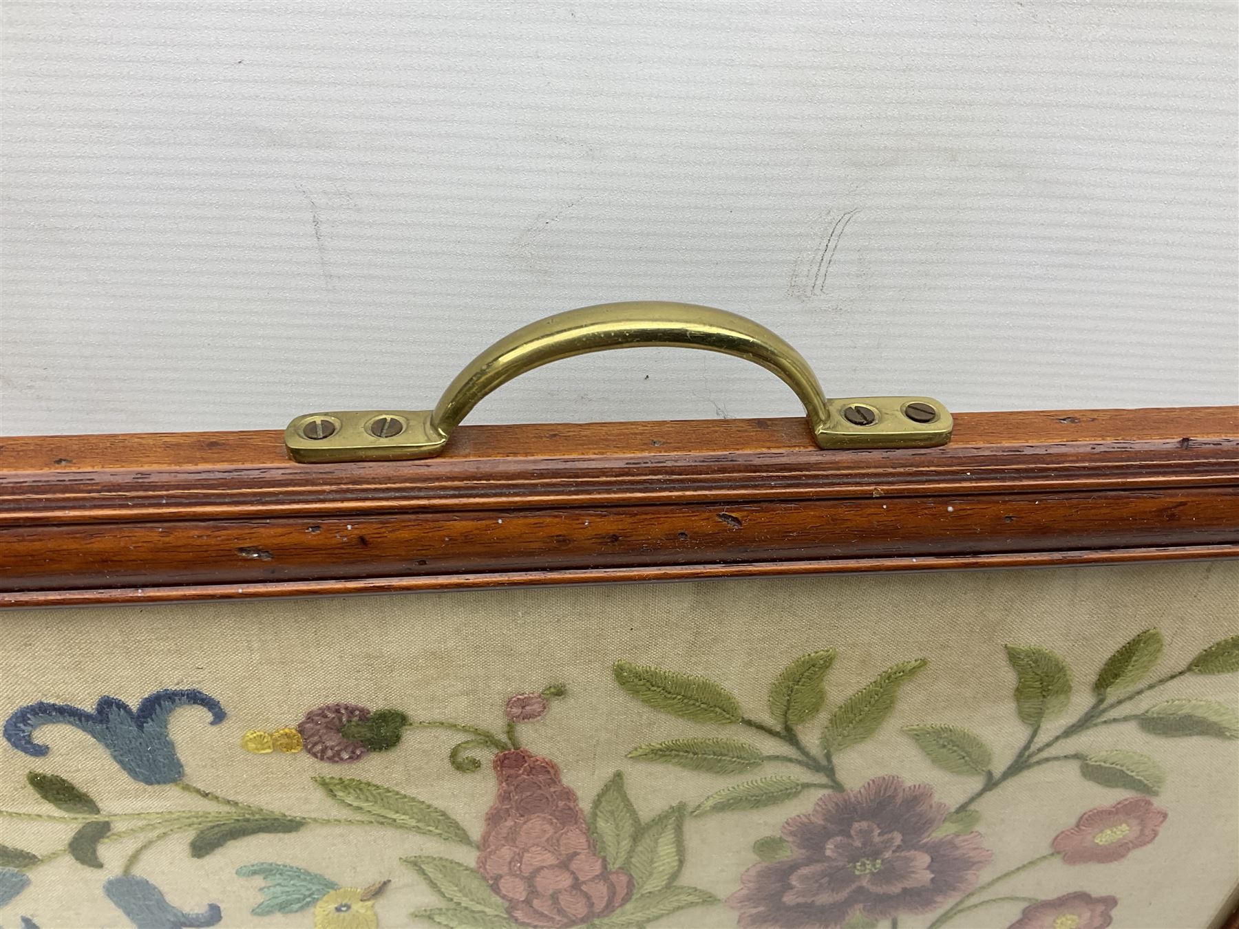 Two 1950s tapestries, the framed example celebrating the 1953 coronation, the second converted into a fire screen depicting a floral display, firescreen H70cm (2)