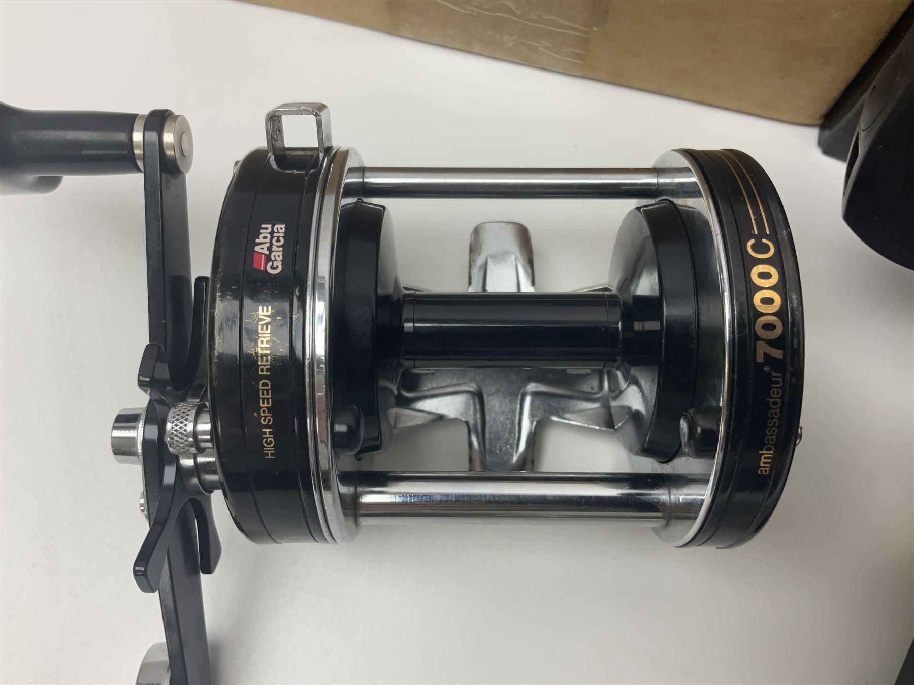 Three multiplier spool sea fishing reels, to include Swedish Abu Ambassaduer 700c Black, with spare spool, Swedish Abu Garcia Ambassadeur 6500 C3 CT MAG and Penn 515 MAG2, all boxed