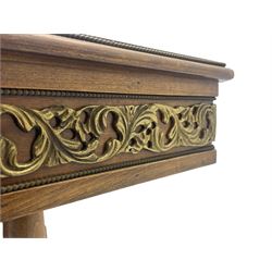 Mid-20th century figured walnut Italian design centre table, octagonal quarter veneered top with cross banding and moulded edge, the skirt decorated with scrolling foliage gilt metal mounts, on turned pedestal mounted with gilt acanthus leaves, quadruple splayed supports with further acanthus leaf decoration