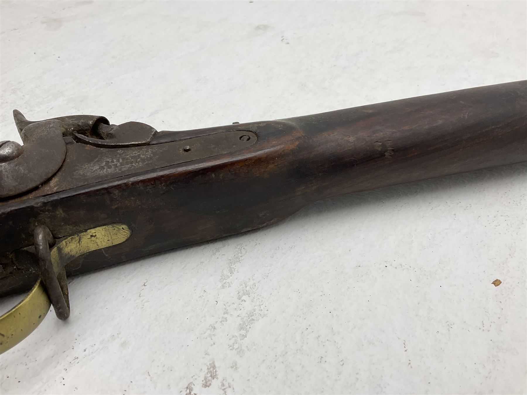 20th century Indian percussion musket, the 76cm barrel with two bands, indistinctly inscribed lock-plate, walnut full stock stamped 642 with brass butt and trigger guard and under barrel ramrod channel L121cm overall