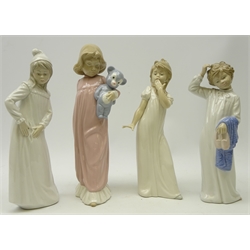 Four large Nao figurines including Boy with Slippers No. 0232, 'Yawning Girl' No. 0230, H29cm and two others (4)