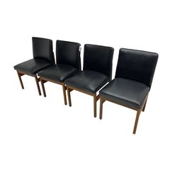 Set four teak chairs upholstered in black faux leather, raised on square supports 