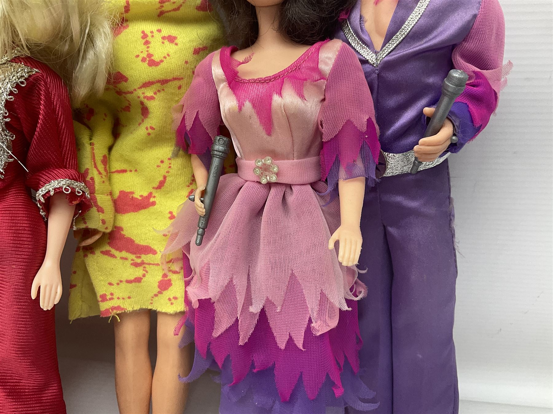 Pelham Puppet - Tyrolean Girl in yellow box; three 'A' Team action figures; clockwork plastic Mickey Mouse figure; and seven various fashion dolls (12)