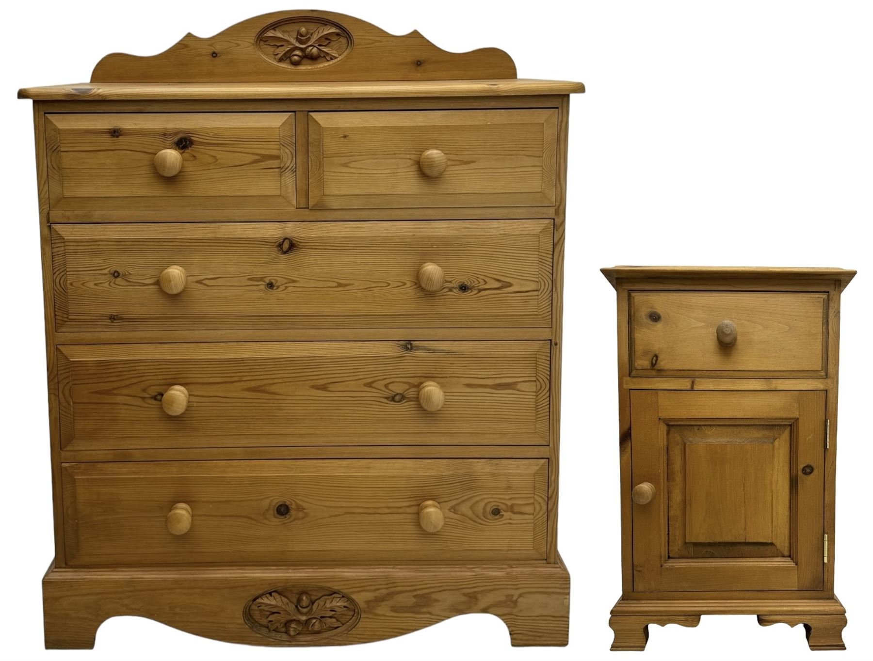 Pine chest of drawers topped with carved pediment with acorn and oak leaf motif, fitted with two short over three long drawers, standing on shaped apron base (W92, D46, H97cm); pine bedside cabinet, single drawer above paneled cupboard door enclosing open storage, shaped plinth base (W43, L32, H67cm)