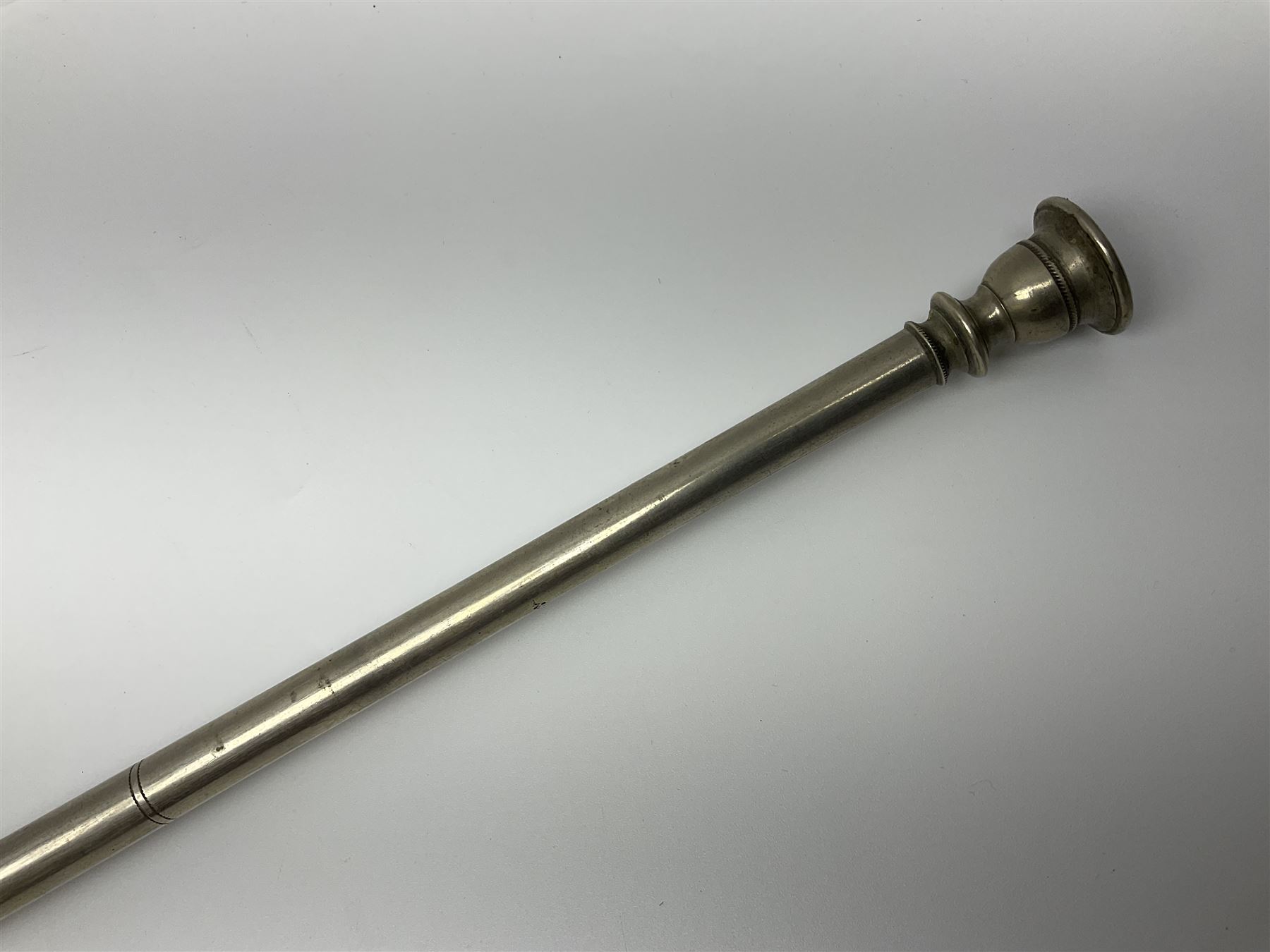 19th century telescopic hunting horn, the bell engraved 'The Beaufort', with makers mark Kohler & Son, makers, 61 Victoria Street, Westminster (from Covent garden) London, in a leather sheath, horn full extended L91cm 