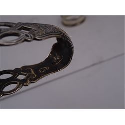 Pair of Victorian silver sugar tongs, with pierced decoration, hallmarked Hilliard & Thomason, Birmingham 1892, together with three hallmarked silver napkin rings