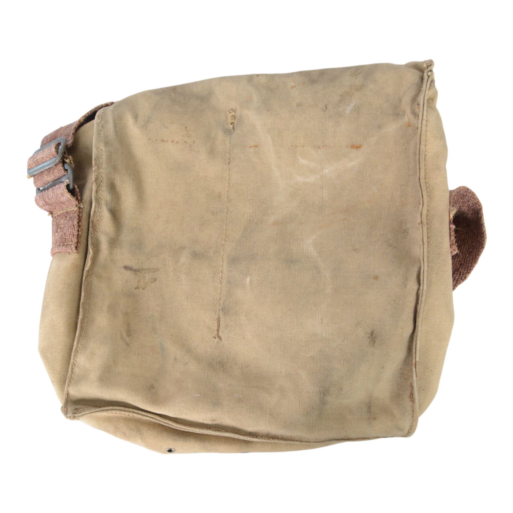 Collection of 20th century military related items, including leather gaiters, field binoculars, canvas bag, spurs 