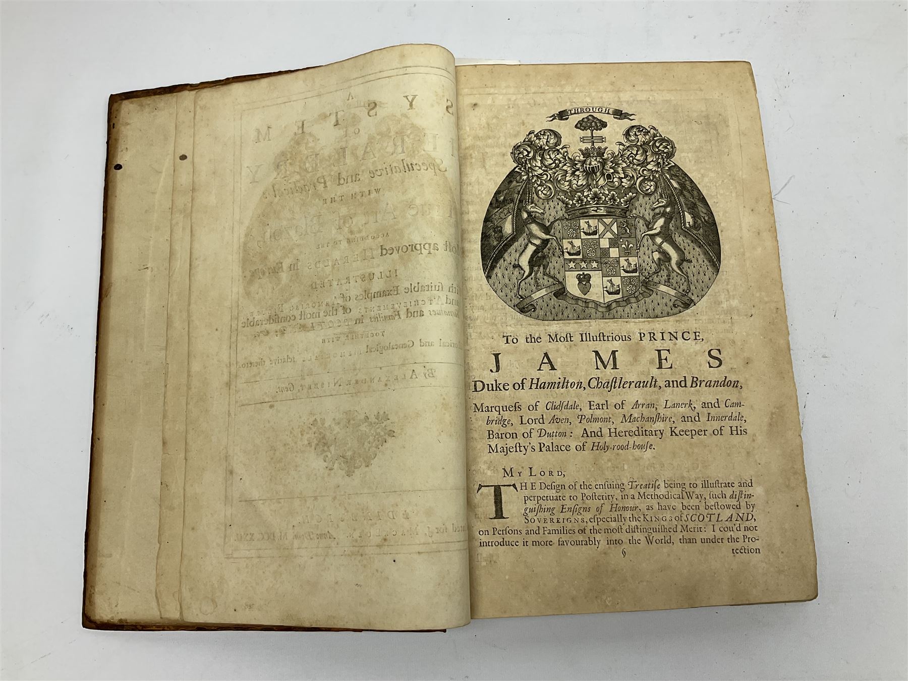 Nisbet Alexander: A System of Heraldry Speculative and Practical with the True Art of Blazon According to the Most approved Heralds in Europe[...], R. Fleming, Edinburgh, 1722, 1742, 2 vols, engraved plates, full calf binding re-backed using original boards 
