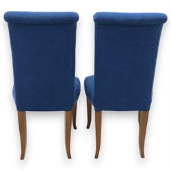 Contemporary set of four blue high back upholstered dining chairs