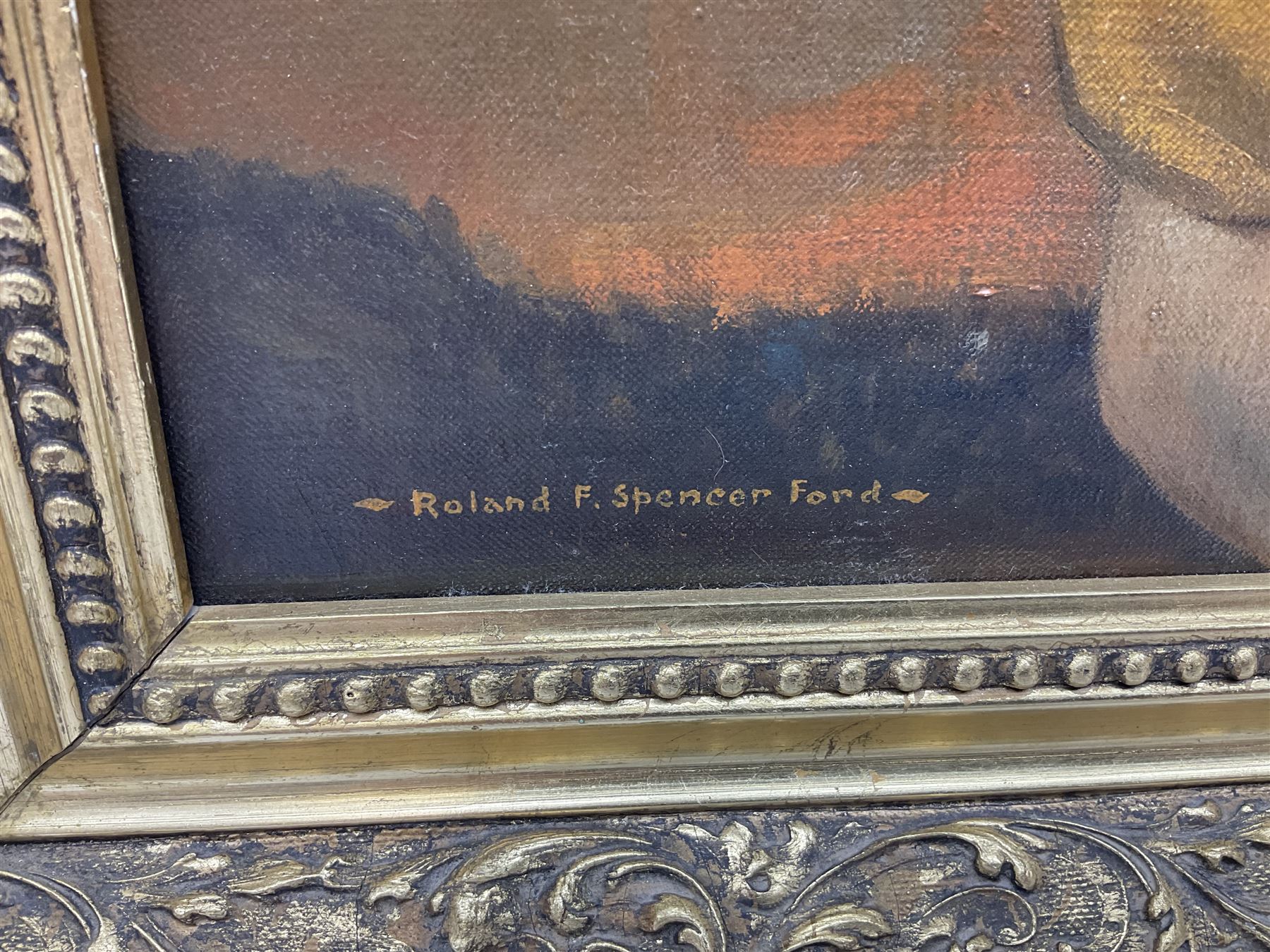 Roland F. Spencer Ford (1902 - 1990), oil painting on canvas, half length portrait of Raich Carter, standing dressed in Hull City kit, the Hull town crest in the background surrounded by the names Hull City A.F.C., Sunderland, Derby County and England, bears label verso from the studio of the artist in Newstead Street, Hull with original price of £75, signed, 59.5 x 49.5cm, gilt frame with metal plaque inscribed ' Presented by the Management Committee/of the Hull City Supporters Clubs/as a mark of esteem and appreciation/for services rendered to/Hull City A.F.C./and to football in general/October 1952'. Provenance: By direct descent from the family of Raich Carter having been consigned by his daughter Jane Carter.