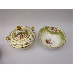 19th century English porcelain tea service, comprising teapot, thirteen teacups, eleven coffee cups, twelve saucers, twin handled sucrier and cover, slop bowl, and cream jug, decorated in pattern no 1923, with panels of floral sprays within gilt scrolling borders on an apple green ground