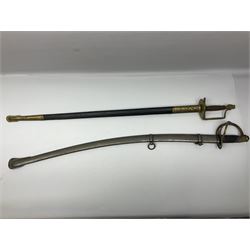 Reproduction American Civil War Cavalry trooper's sword, the 88cm slightly curving fullered steel blade marked to the ricasso 'Ames & Co Chicopee Mass.' and 'US ADK 1862'; brass hilt and leather covered grip; in steel scabbard; and Indian reproduction 19th century French court sword (2)