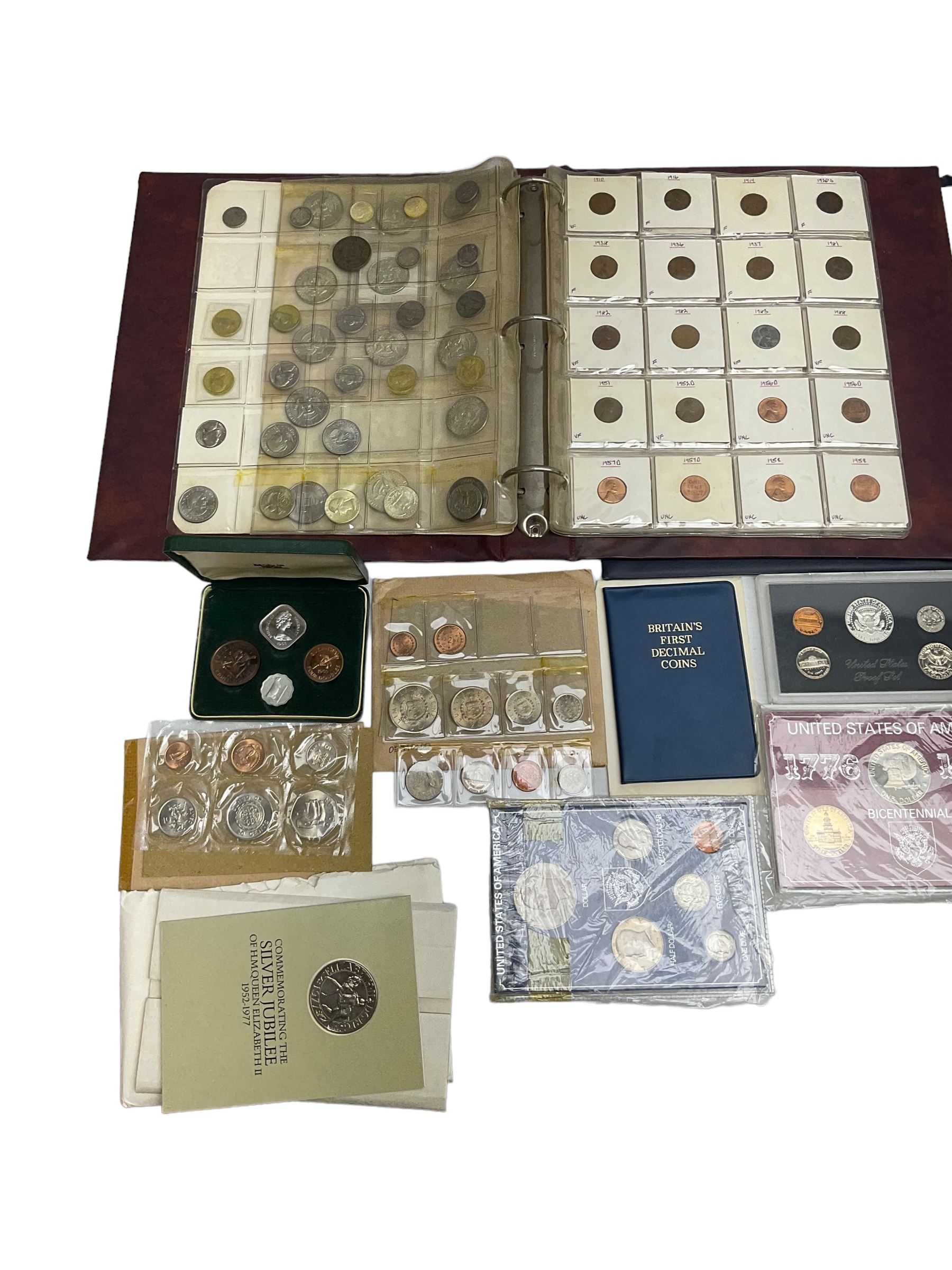 Great British and World coins, including various United States of America unofficial coin sets, Queen Elizabeth II Guernsey 1966 four coin set in The Royal Mint green case, Canada 1977 silver dollar, Isle of Man four coin crown set, Great British pre decimal coinage etc