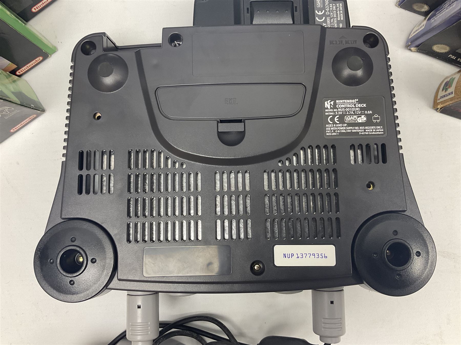 Nintendo 64 console, two controllers, games and accessories. Accessories to include the ‘Tremorpak’ and ‘Spook’ 2 Phono plugs and a S-VHS plug with adapter, both in original boxes. Games to include ‘Golden Eye 007’, ‘Doom 64’, ‘Killer Instinct Gold’, ‘Tetrisphere’, ‘F-1 World Grand Prix’, ‘Pilotwings 64’ and ‘Lylatwars’ with ‘Rumble Pak’, all with original boxes and instruction manuals. ‘Star Wars Episode I Racer’ game cartridge in Shadows of the Empire box. 