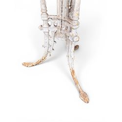 Victorian ornate cast iron garden table, trefoil base with central enclosed column, circular top with later marble, with registration mark