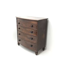 Victorian mahogany bow front chest, four graduating drawers on turned supports