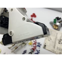 Collection of early 90s Mighty Morphin’ Power Rangers Zords, figures and accessories. Titanus the Carrier Zord, marked Bandai 1991; Green Dragonzord, incomplete; 1994 White Tigerzord with original instruction manual; 1993 Triceratops Dinozord, Mastodon Dinozord and Sabertooth Tiger Dinozord, Pterodactyl Dinozord, missing guns; with 1993 Power Morpher and original Power Coins, with further related figures, accessories and weapons