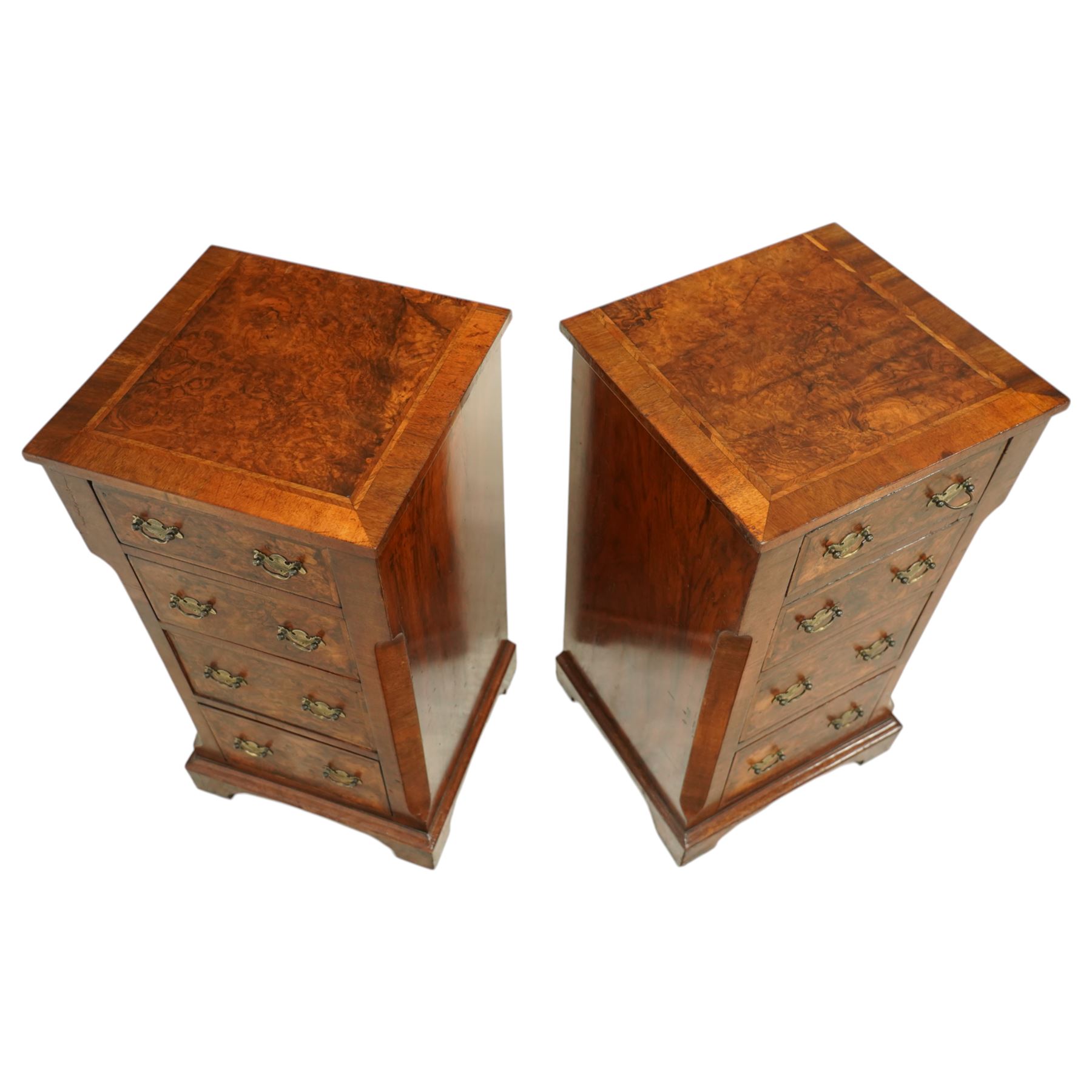 Pair of Victorian inlaid burr walnut small size chests,  rectangular top in burr walnut and crossbanded with herringbone inlay and chamfered sides with four graduated inlaid burr walnut drawers and engraved cut brass handles and mahogany drawer linings, supported on moulded bases with shaped bracket feet, circa 1870