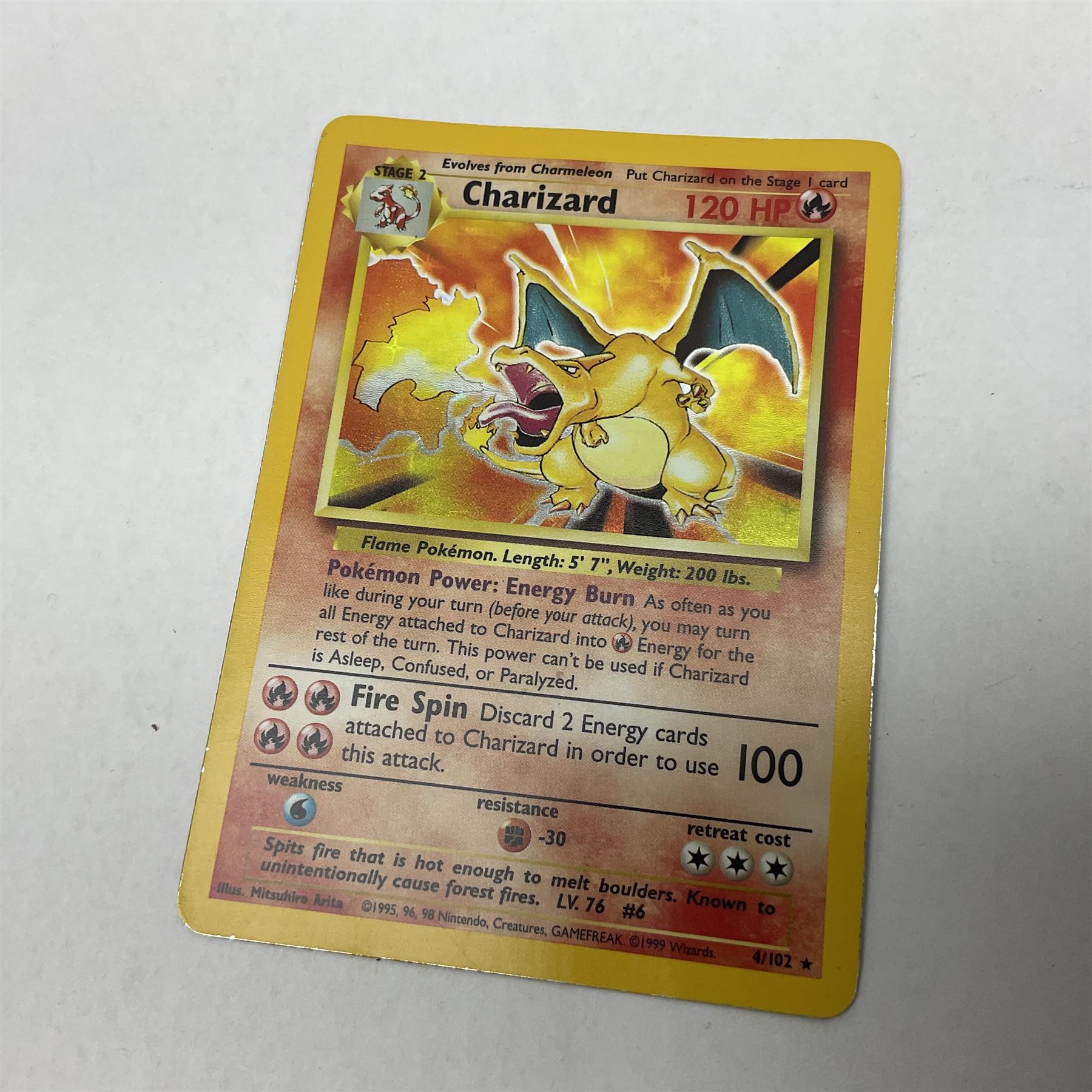 Collection of Pokemon trading cards, mostly 1999 Wizards Pokemon cards to include holo Charizard 4/102, first edition holo Machamp 8/102, further holographic cards; Dark Flareon 35/82 and Dark Vaporeon 45/82, cards from themed sets and 4th edition prints; 1998 Electronic Pokédex with cardboard boxes for themed decks Blackout, Overgrowth and Power Reserve Jungle, along with a large quantity of energy and trainer cards 