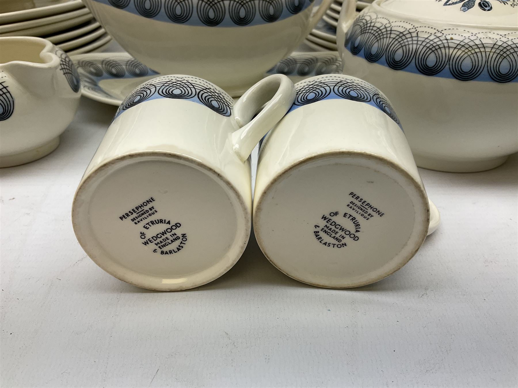 Wedgwood Persephone pattern part tea and dinner service, designed by Eric Ravilious, eight dinner plates, eight side plates, eight dessert plates, two covered tureens, meat platter, coffee pot, eight coffee cans and saucers, milk jug, covered sucrier etc (64)